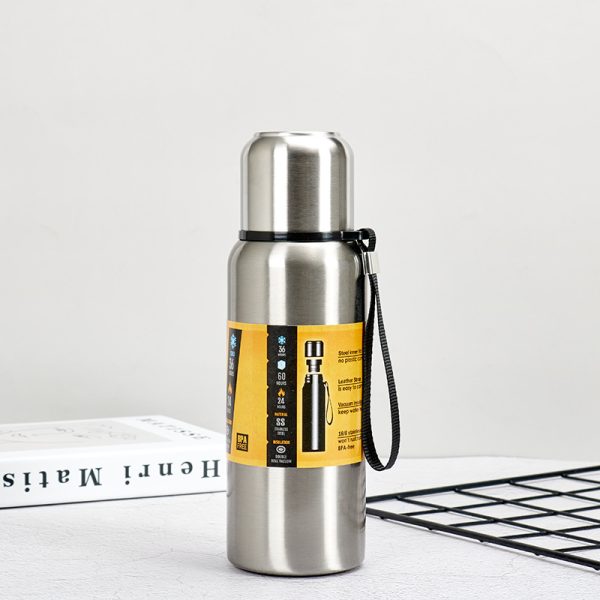 All stainless steel water bottles with a cup lip and rope handle